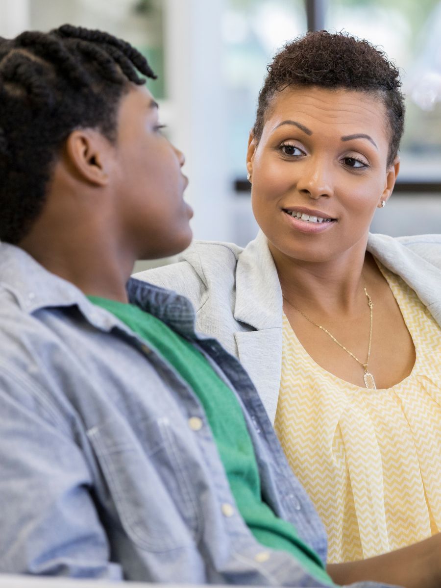 Mother talking to her teenage son