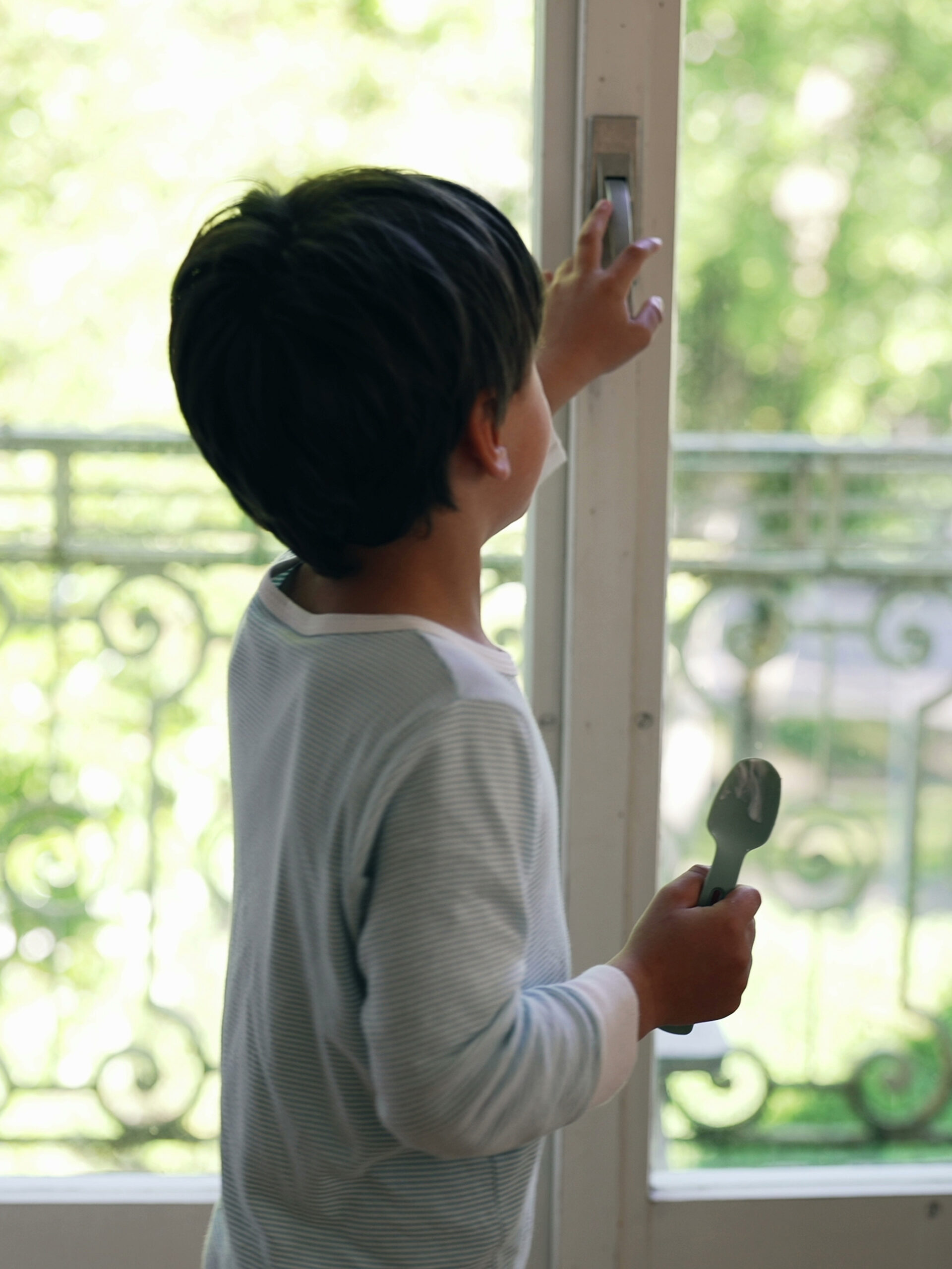 child at window